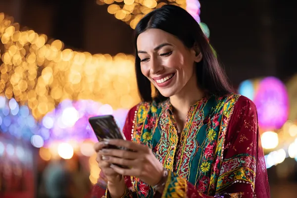 A glowing roulette wheel with cascading chips, symbolizing the engaging live and instant-win games available on 6777DETT.