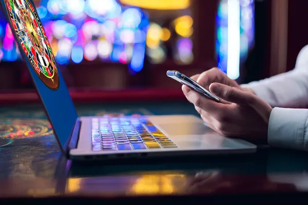 A woman smiling by bright slot machines showing lucky symbols, showcasing the exciting slot offerings at 6777DETT.